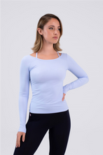 Load image into Gallery viewer, Intermezzo 6660 Cross Ice Skating Top in Pale Blue